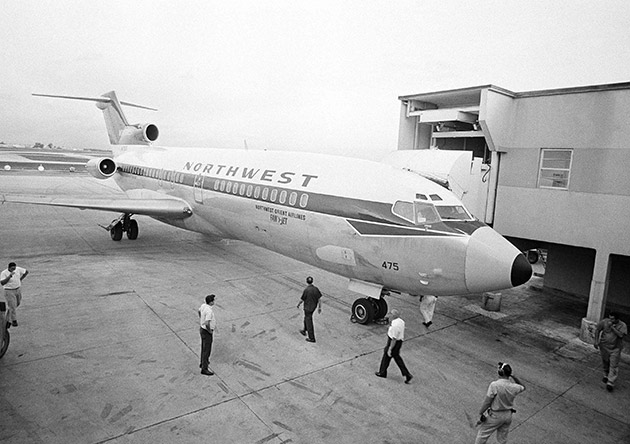 The Northwest Orient Airlines plane that was hijacked to Cuba last night with 87 passengers and 7 crewmen, is docked at the Miami International Airport, July 2, 1968 when it arrived from Cuba with only the crewmen aboard. 