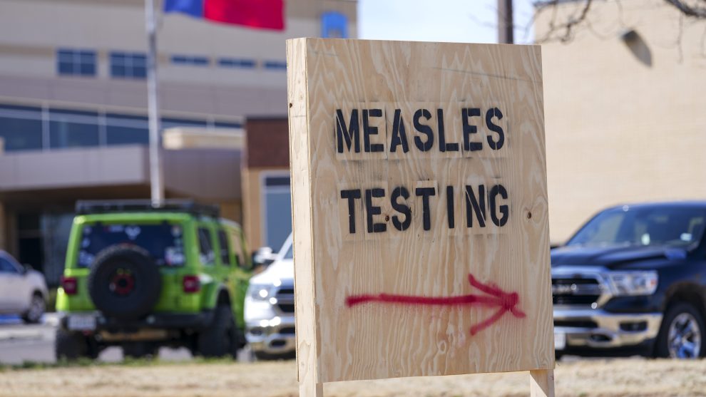 A measles testing sign outside a Texas hospital