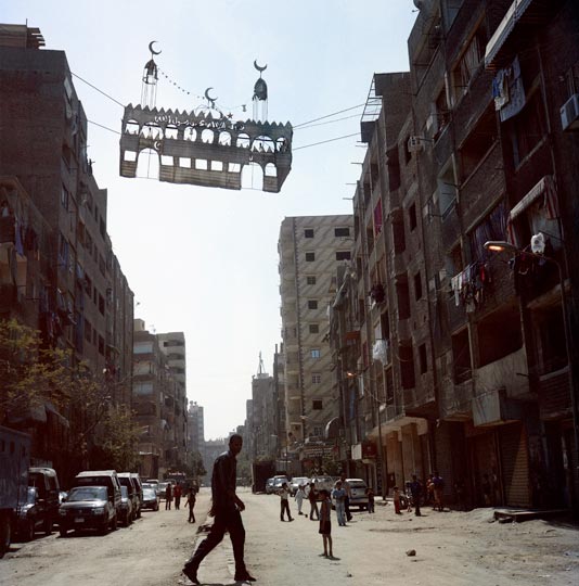 Following sectarian violence in May 2011, Imbaba's Luxor street is cordoned off by the army, limiting access for local residents.
