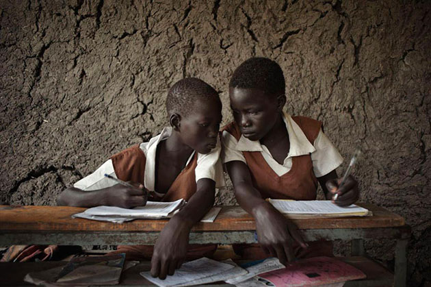 Students in a village school in Owachi, located next to the Nile, in the Upper Nile State. Women's literacy in South Sudan stands at 16 percent, and a 15-year-old girl has a greater chance of dying in childbirth than completing her education.