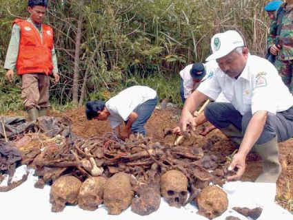 This mass grave was uncovered in central Aceh, the province where a bloody civil war raged for years. A decade-old case alleges Indonesian government soldiers hired by Exxon Mobil tortured, killed, and assaulted villagers in Aceh. Jacqueline Koch, epa/Corbis